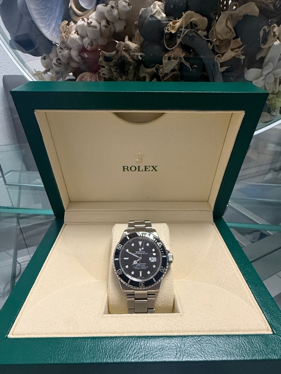Rolex Other - Rolex Submariner with Black Dial. (Box+Appraisal)